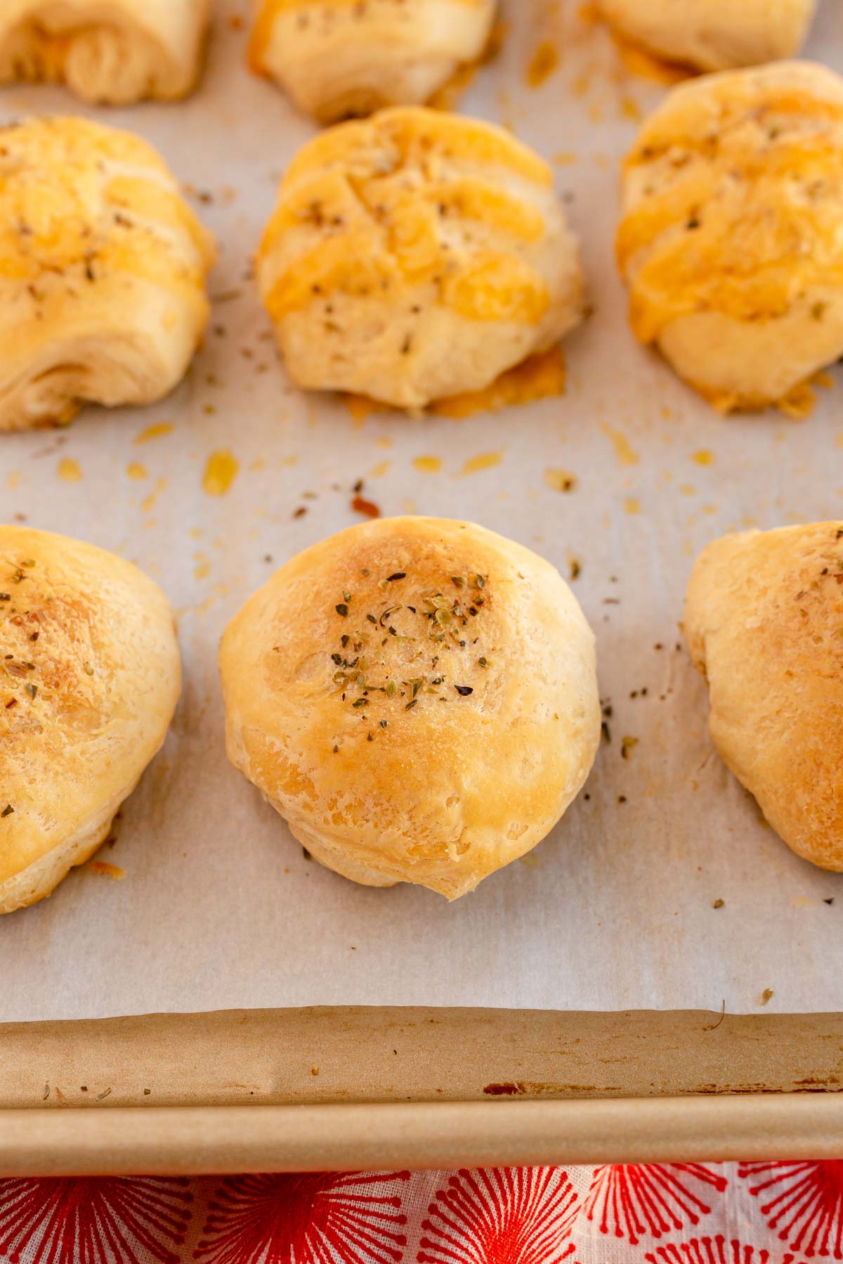 baked cheese bombs on a baking sheet