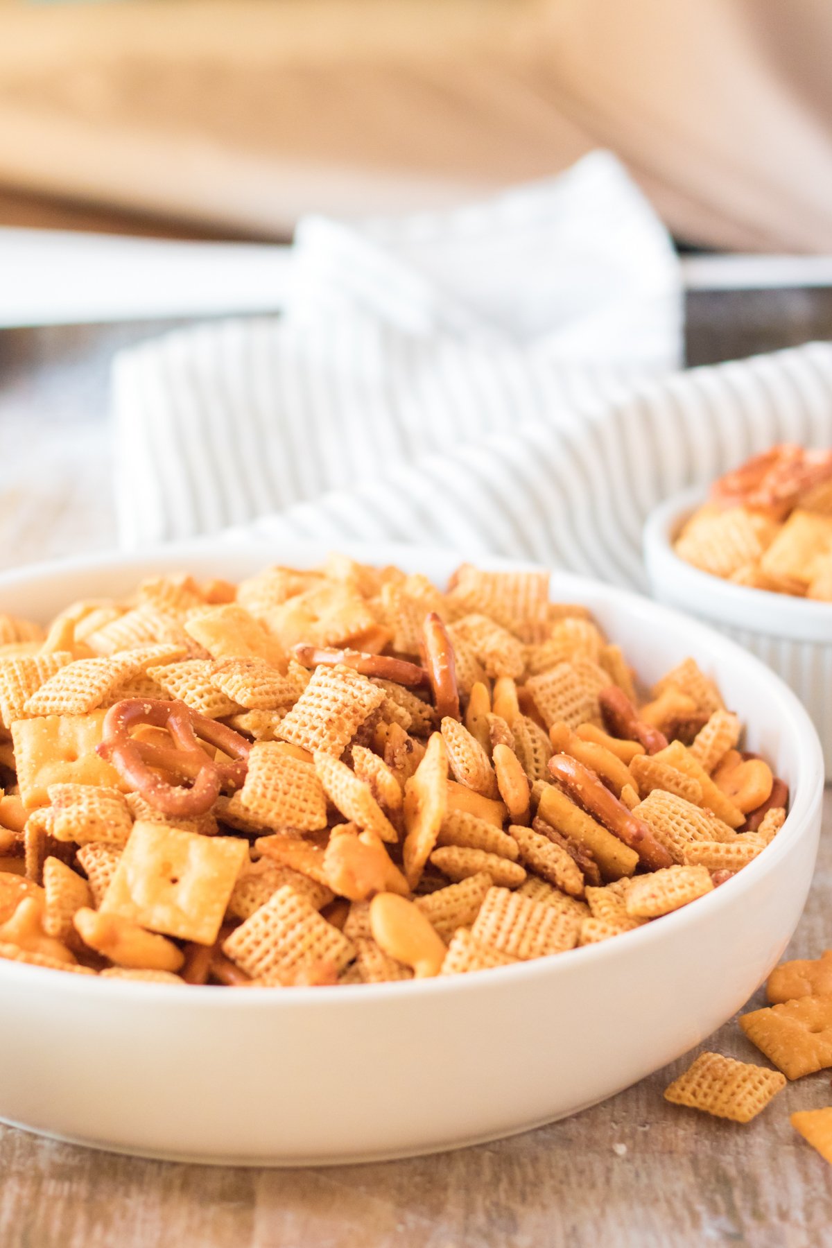 white bowl filled with homemade cheddar chex mix