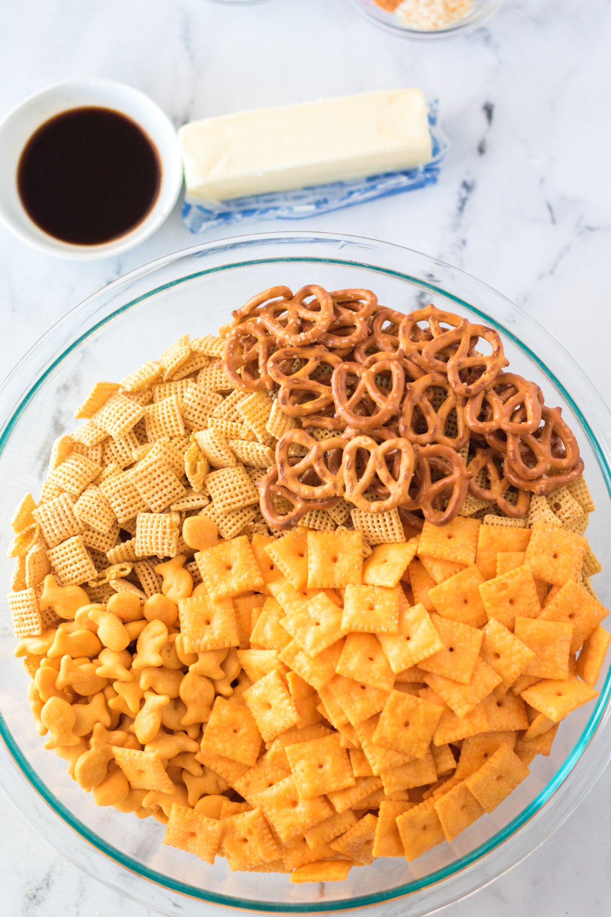 large bowl with cheddar chex mix ingredients