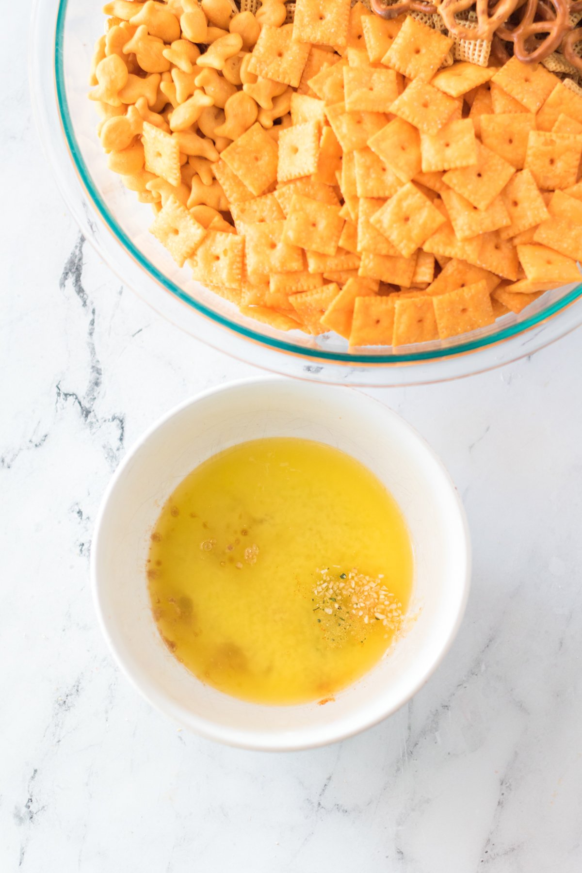 small bowl with seasoning for cheddar chex mix
