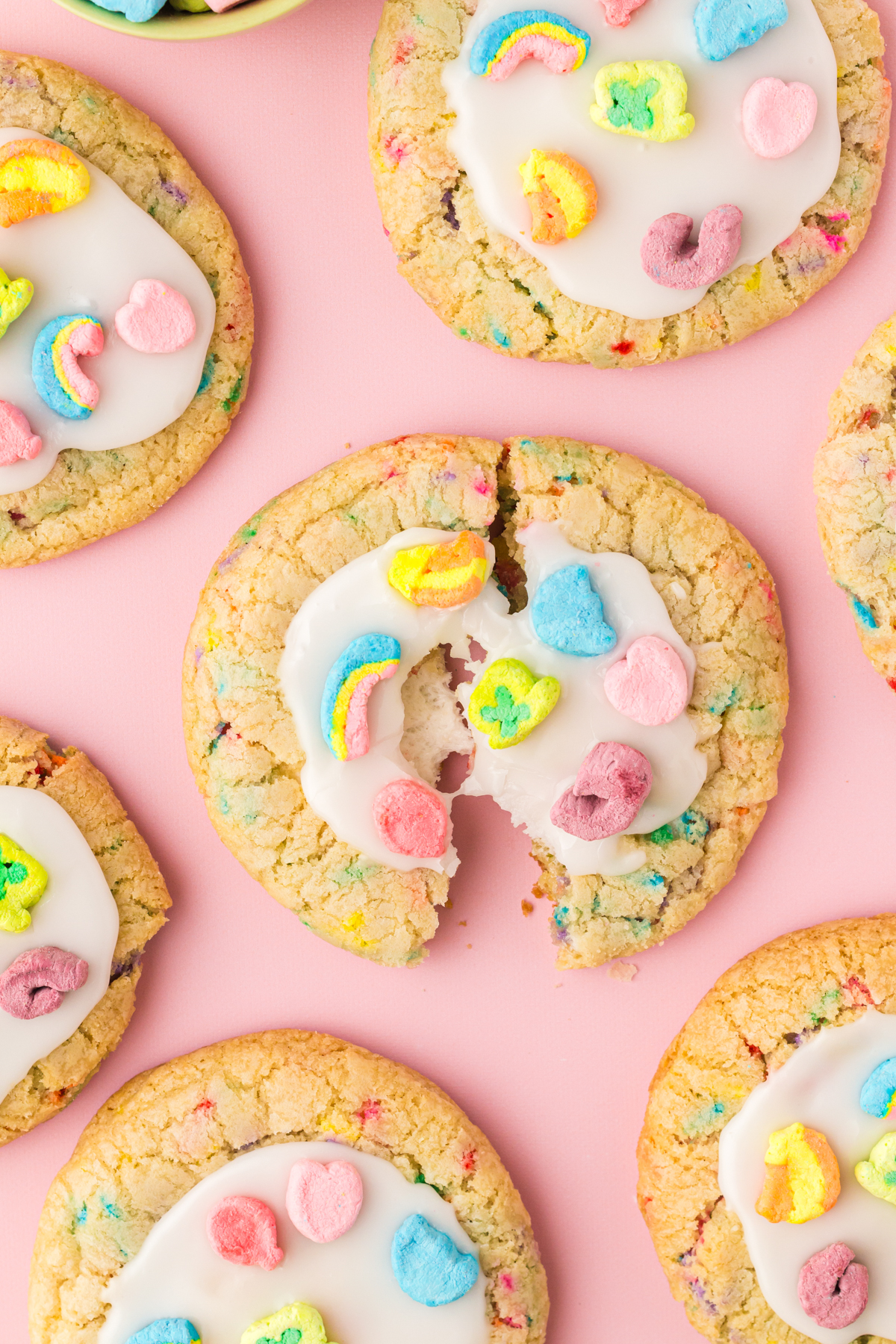 Lucky Charms cookies on a pink background
