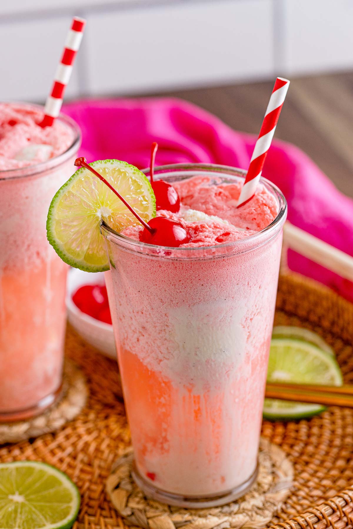 shirley temple soda float garnished with limes