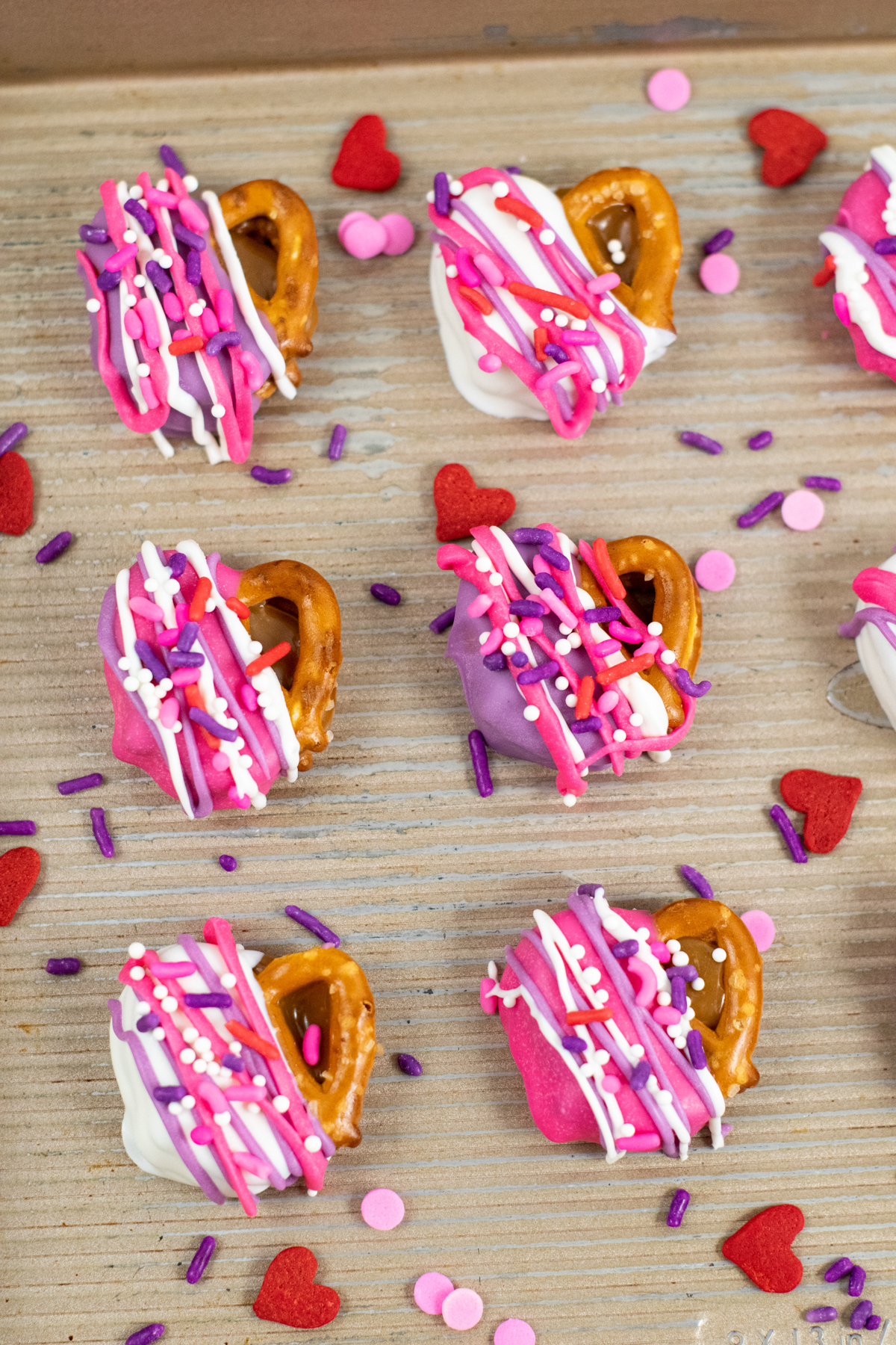 Valentine's Day pretzels on a baking sheet