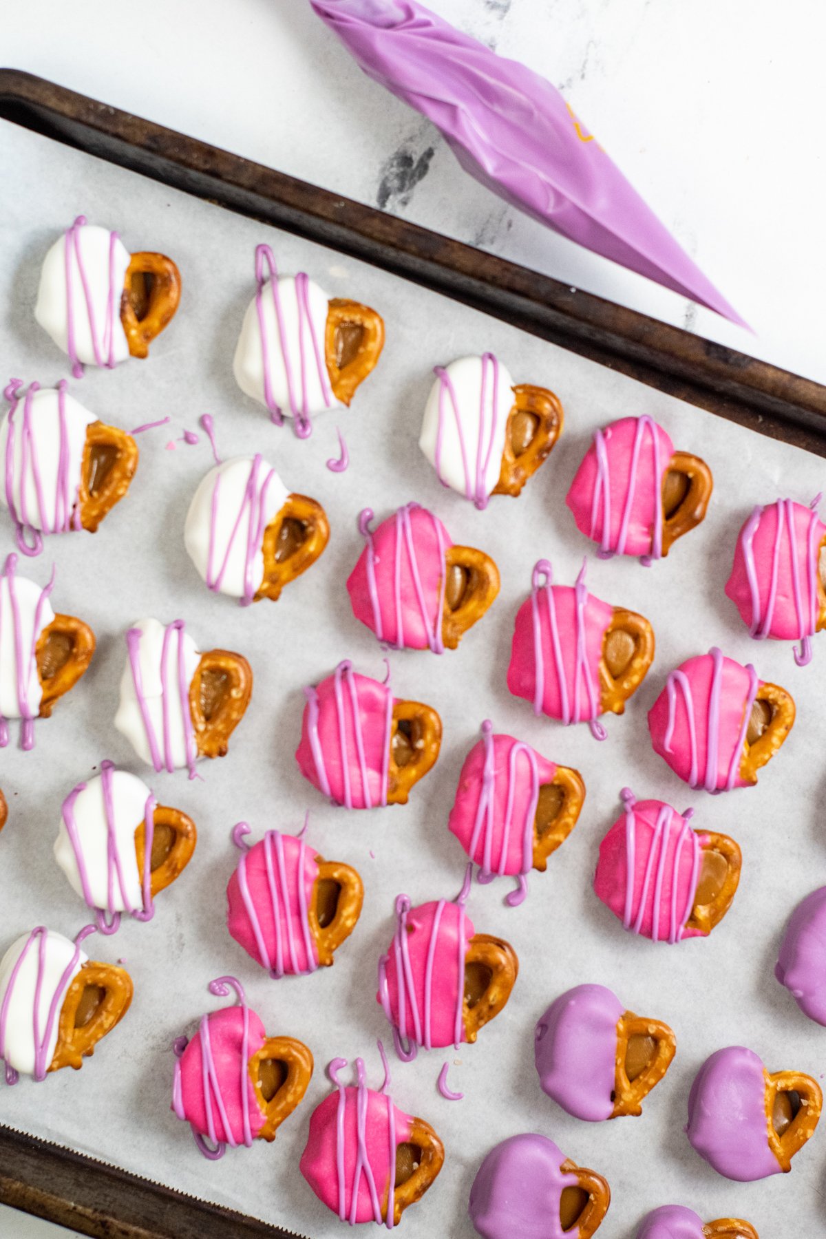 Valentine's Day pretzels dipped in colored candy melts