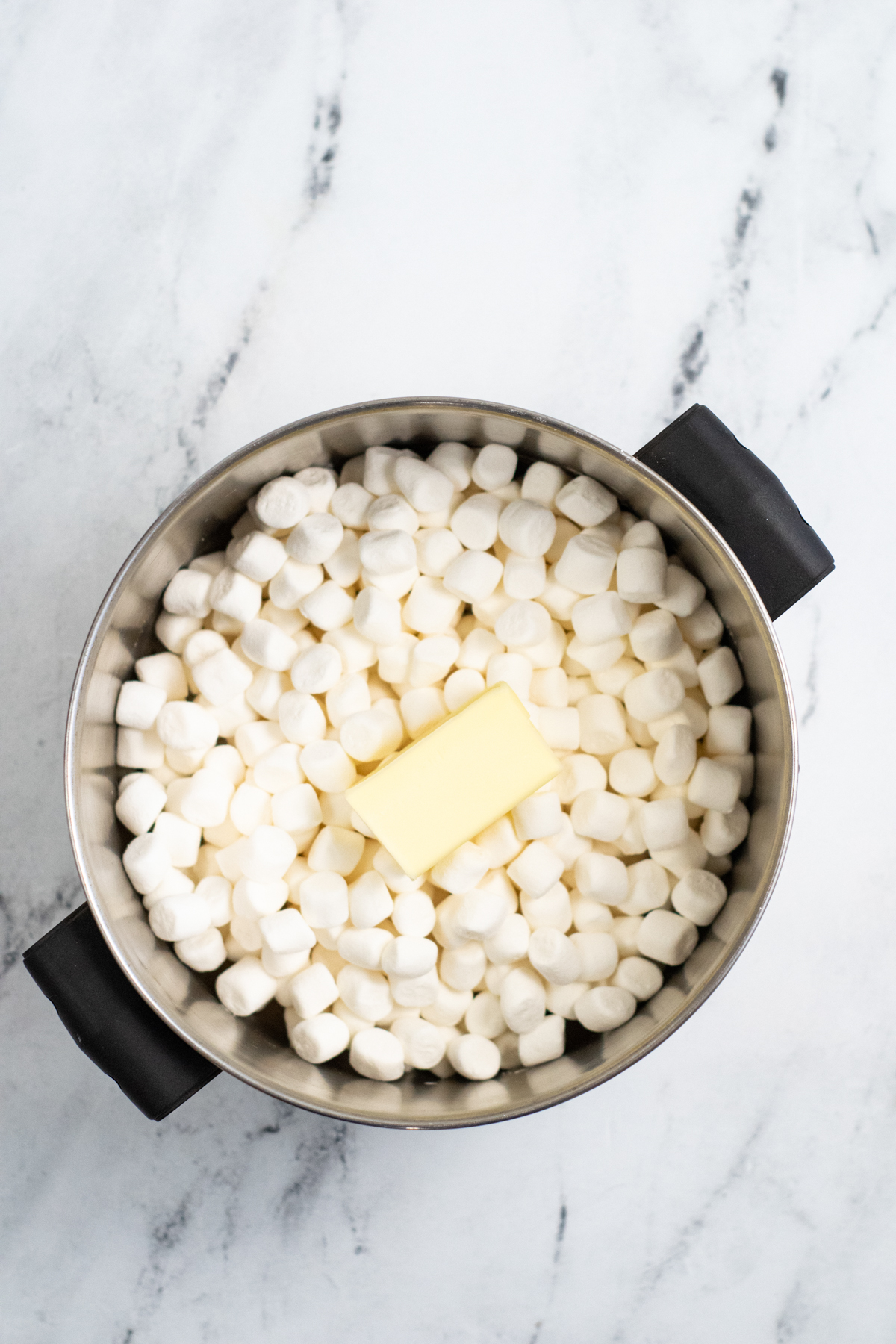 Pot with marshmallows and butter