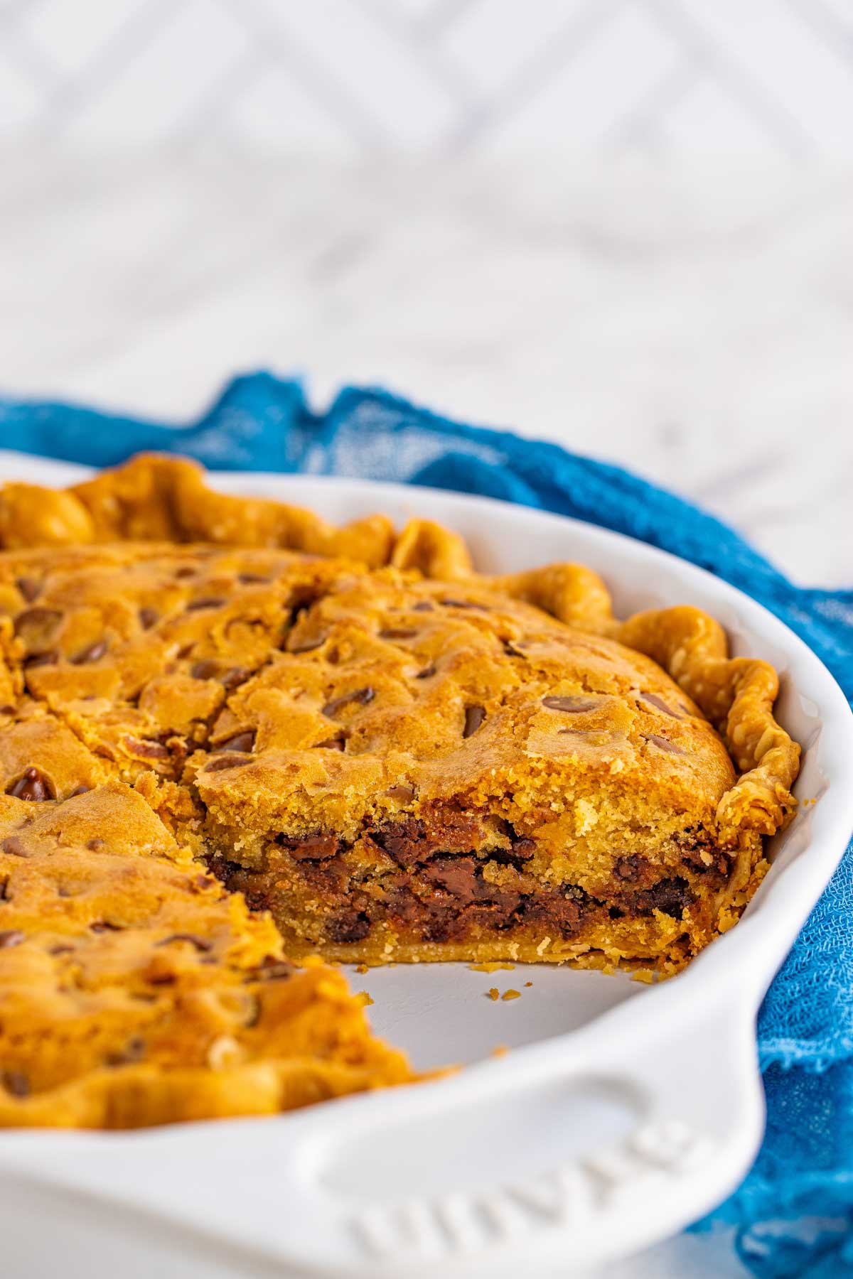 pie dish with chocolate chip cookie pie