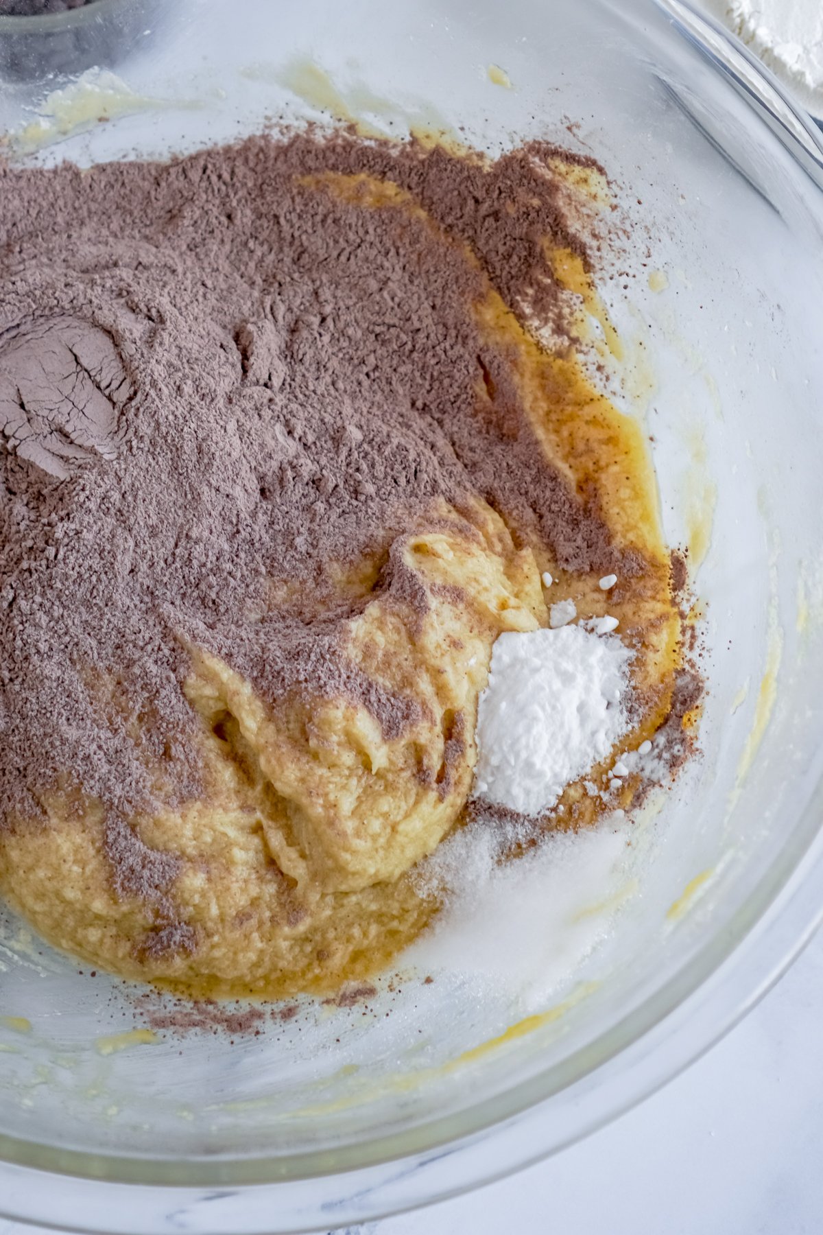 glass bowl with ingredients for dirt cookies