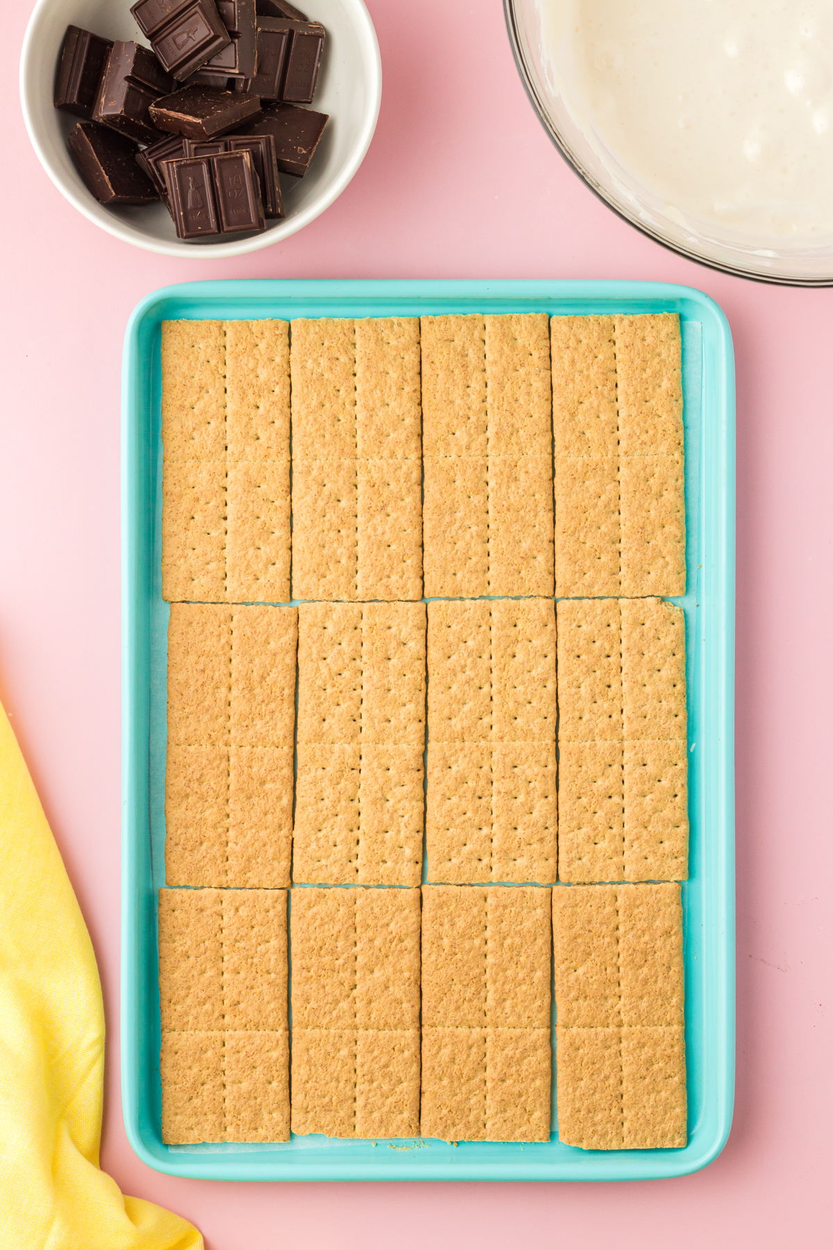 graham crackers lined on a baking treat