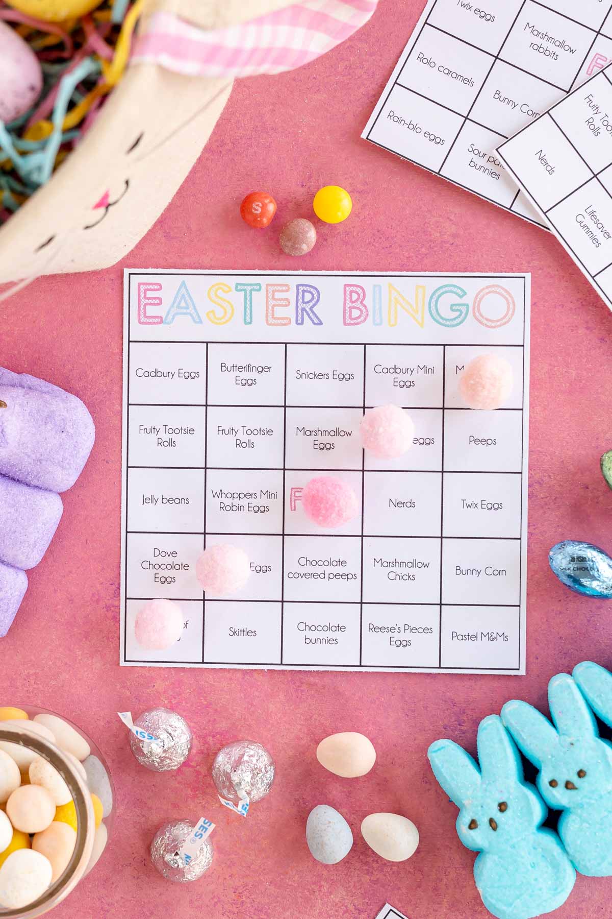 Easter candy bingo card with balls across the middle