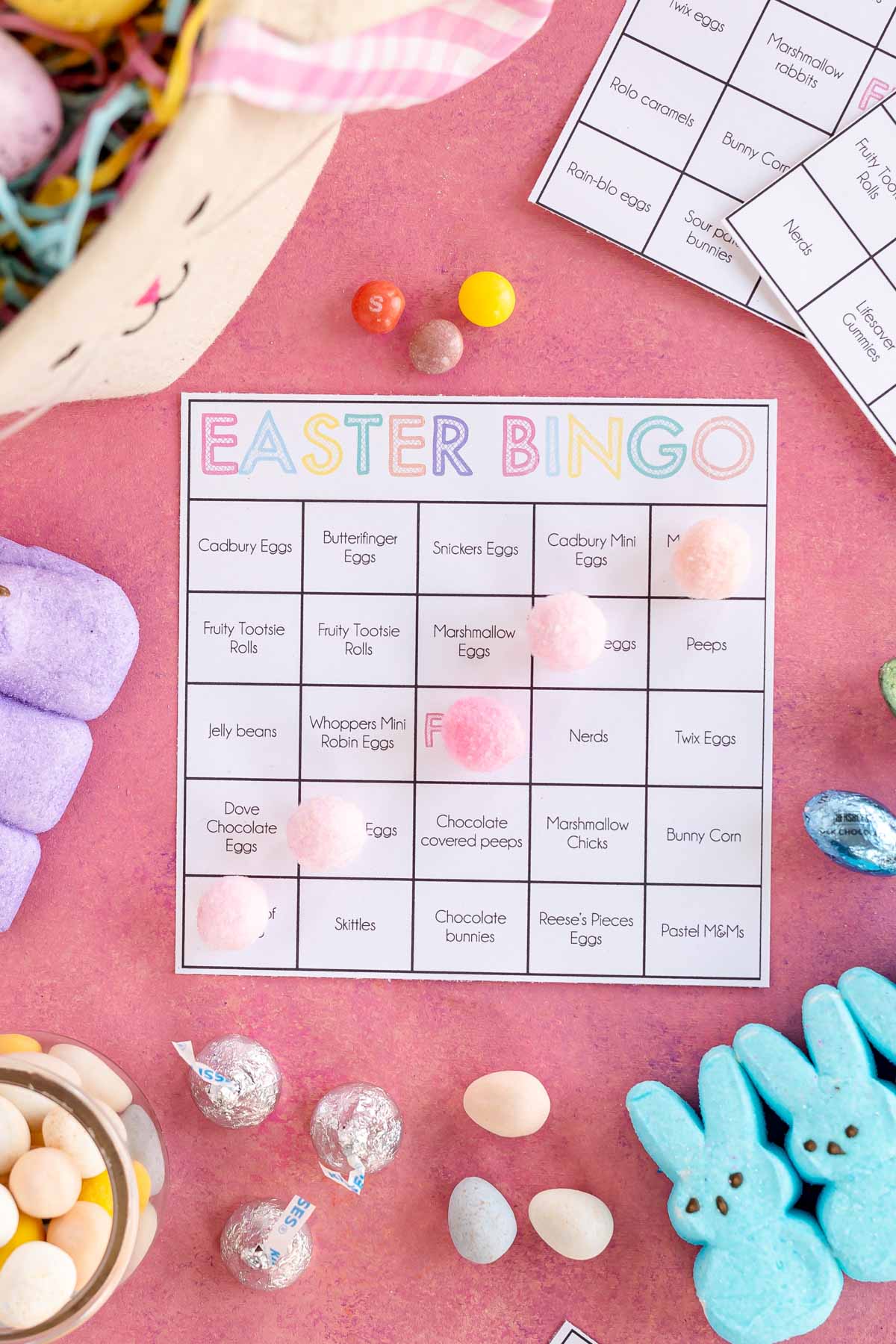 Easter candy bingo card with balls across the middle