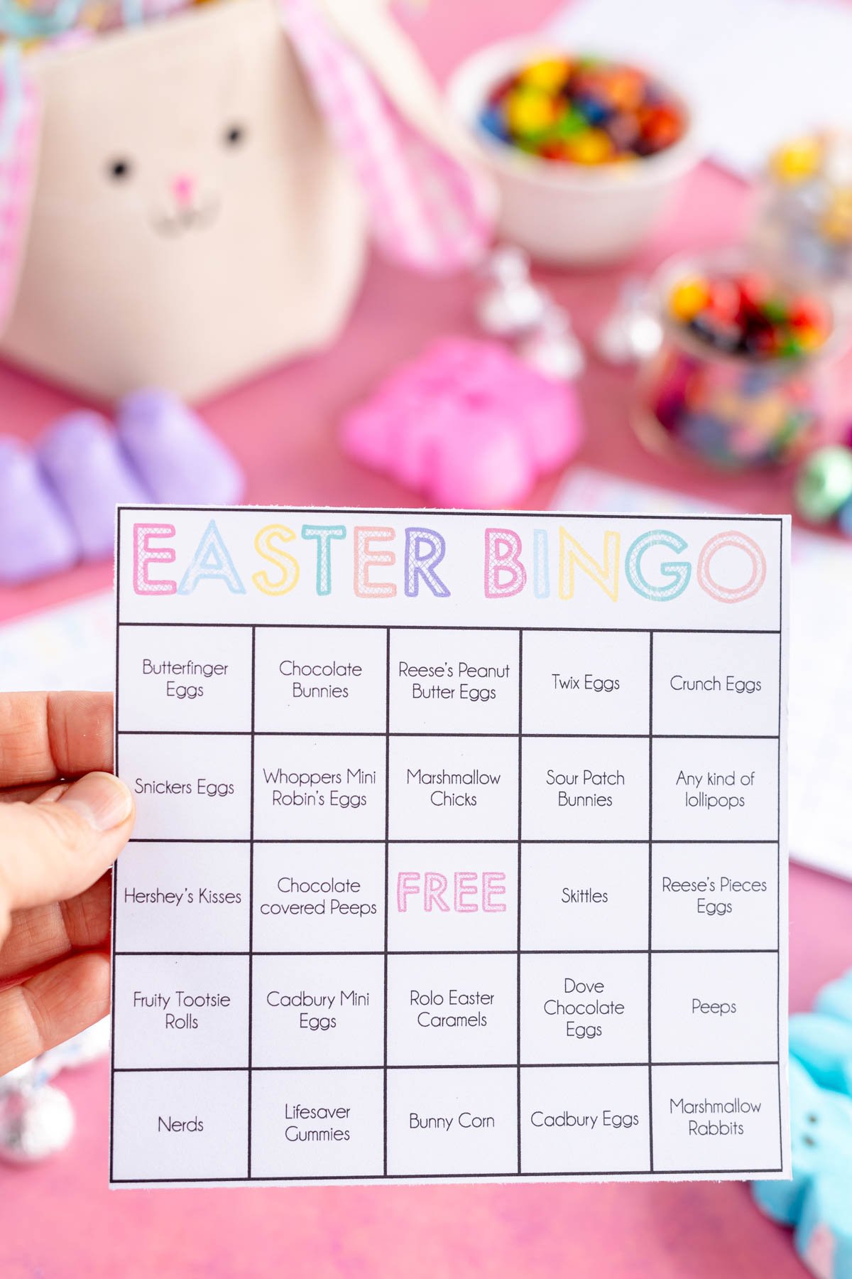 hand holding an Easter candy bingo card