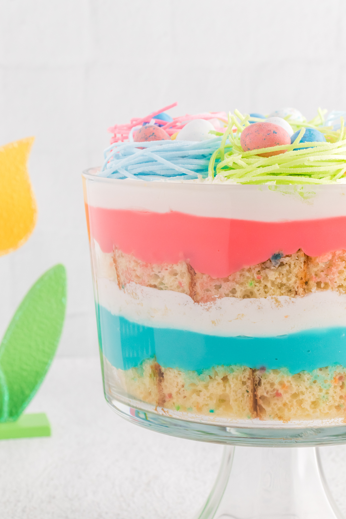Easter trifle with layers of pudding and candy eggs
