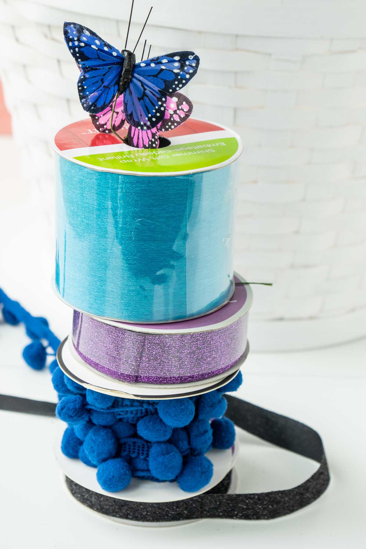 ribbons stacked with a butterfly on top
