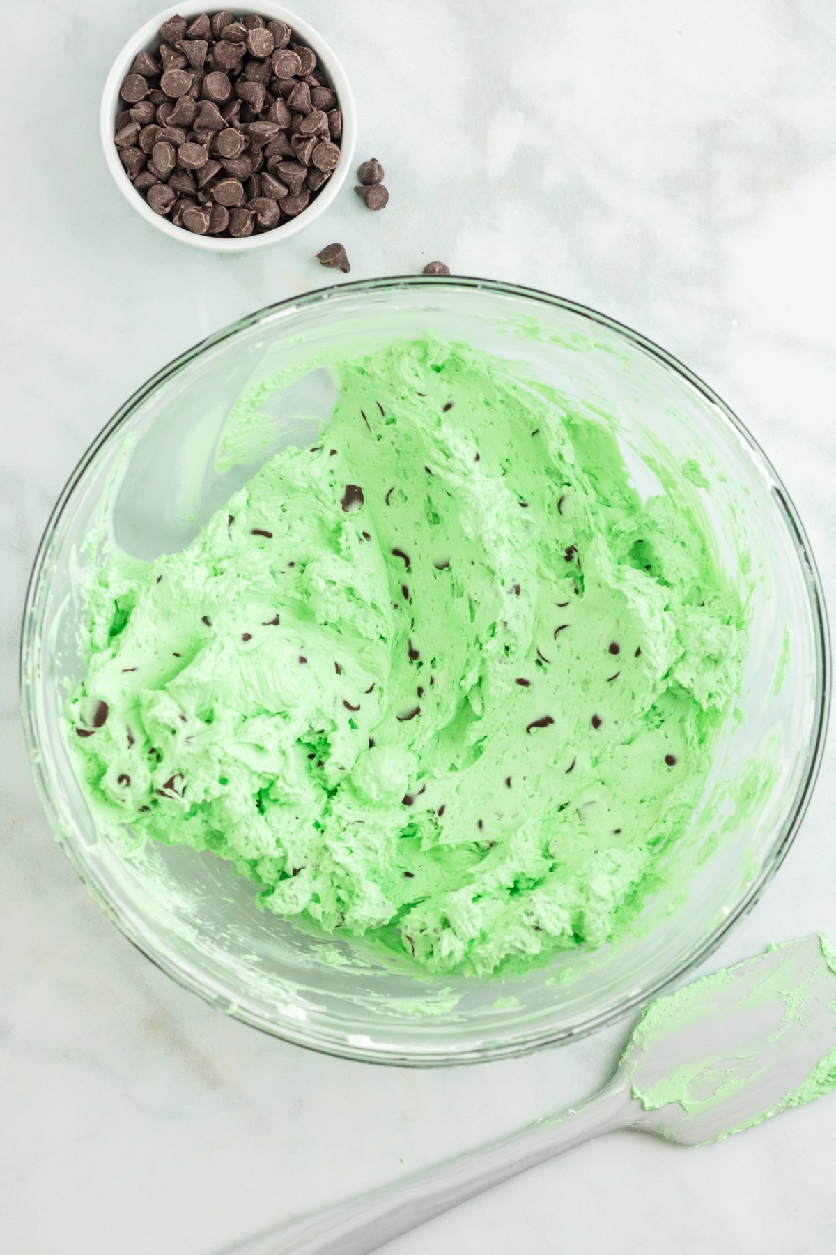 green dessert dip in a glass bowl