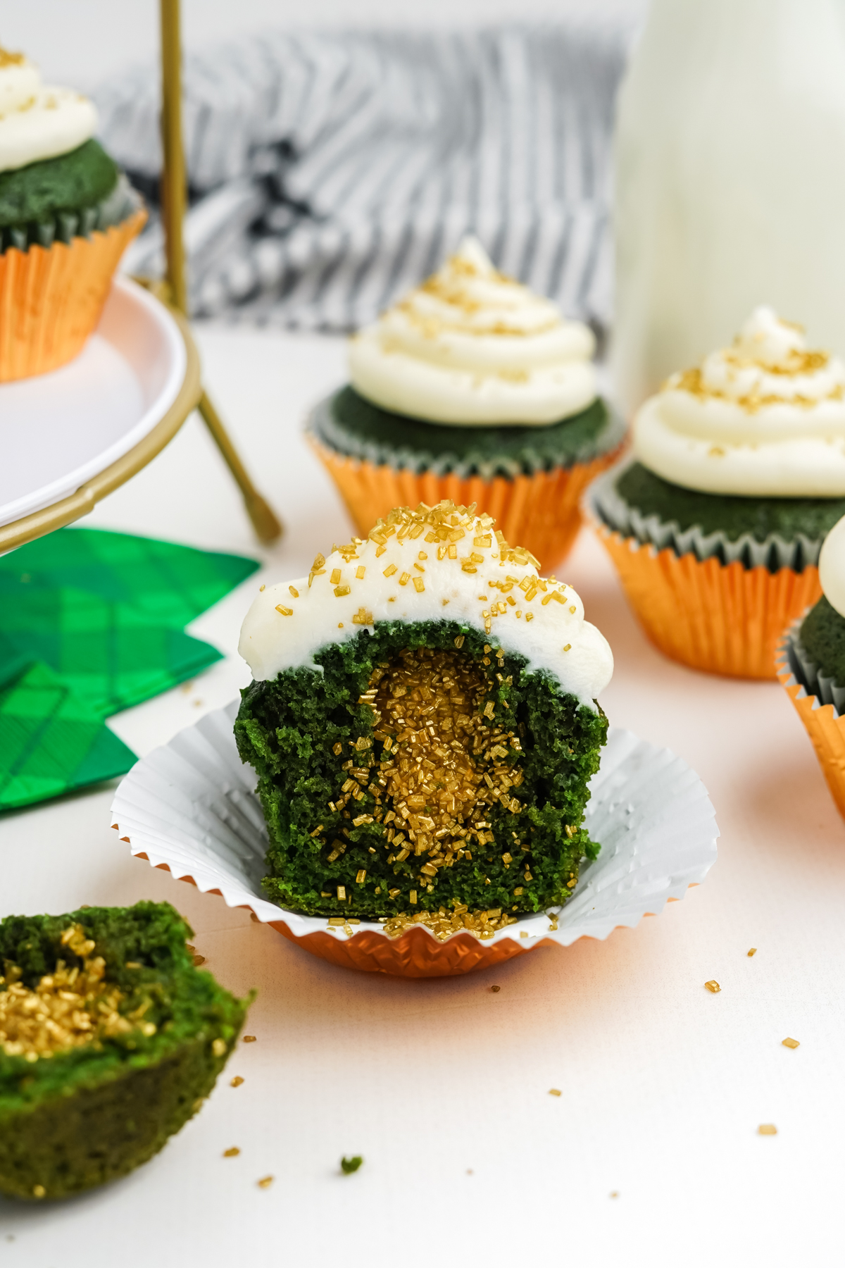 green velvet cupcakes with gold glitter
