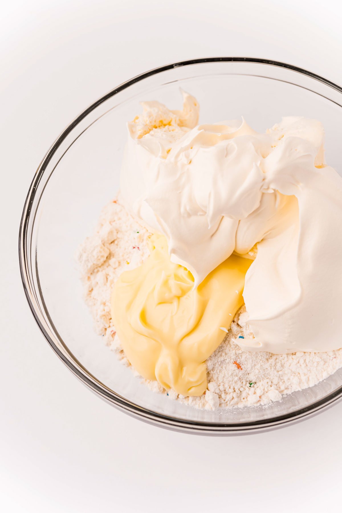 cake mix and pudding in a glass bowl