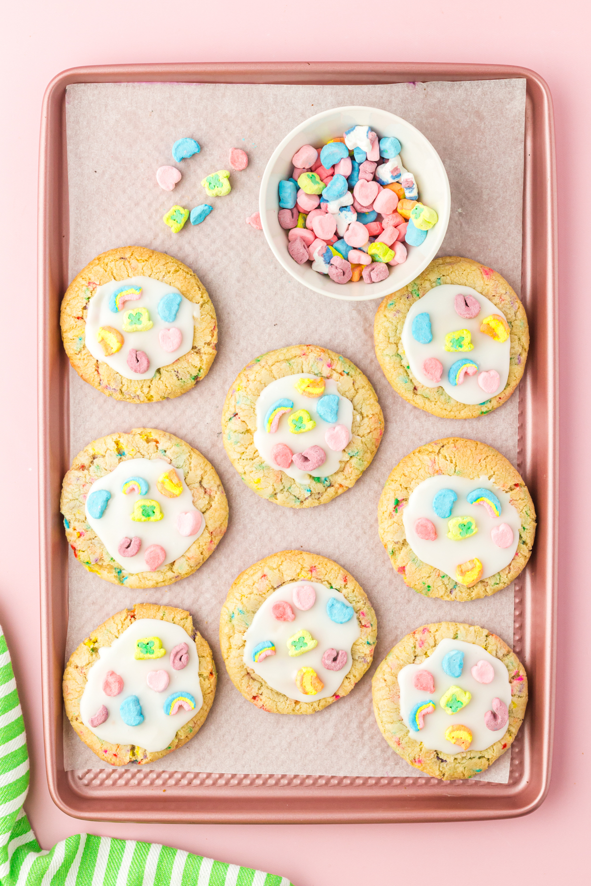 iced Lucky Charms cookies on a baking sheet
