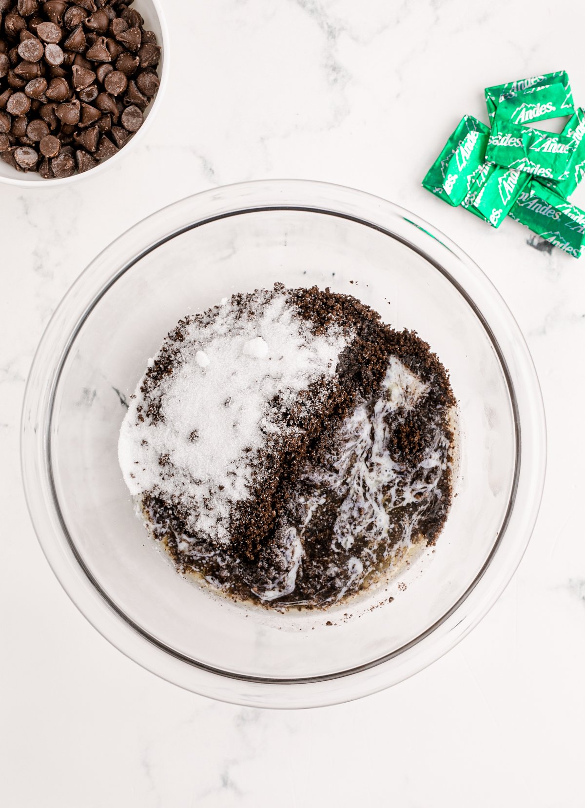 Oreo cookie crumbs in a food processor