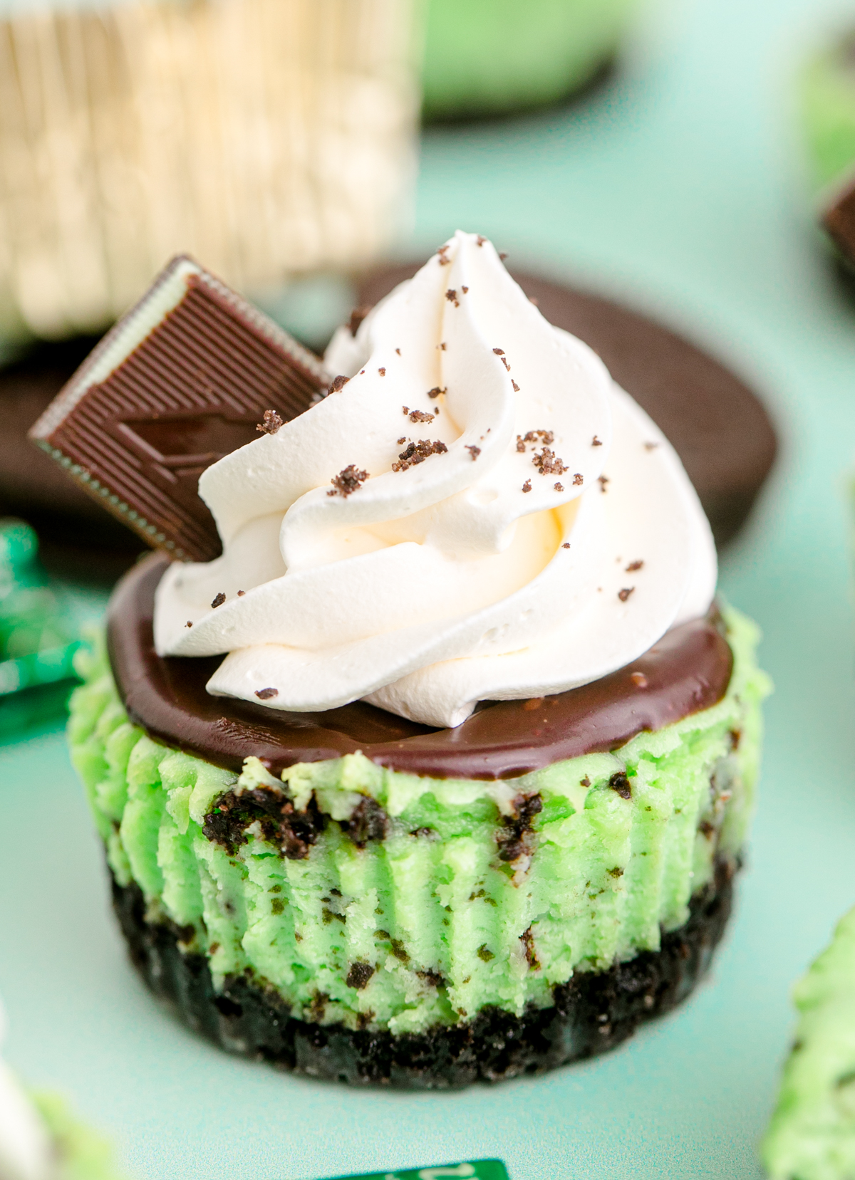 andes mint cheesecake with whipped cream on top
