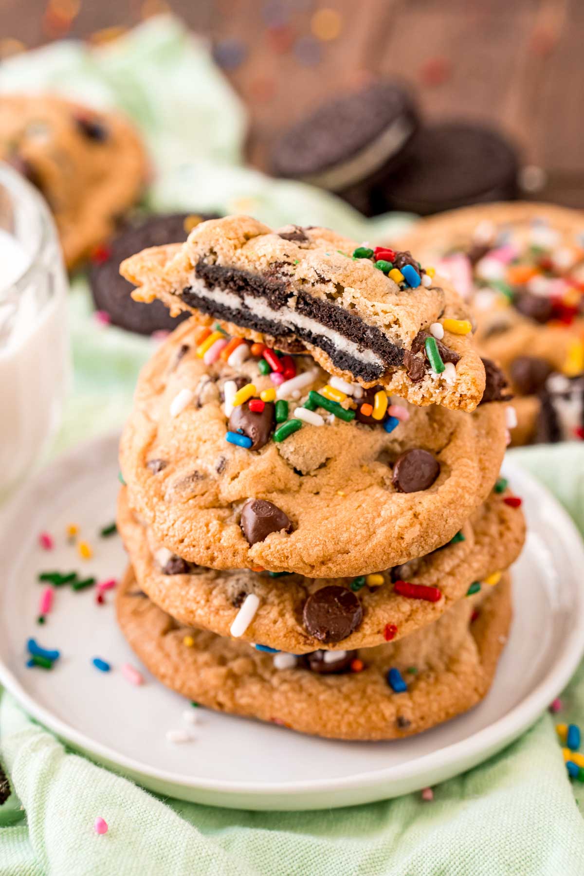 a stacked of Oreo stuffed cookies with sprinkles