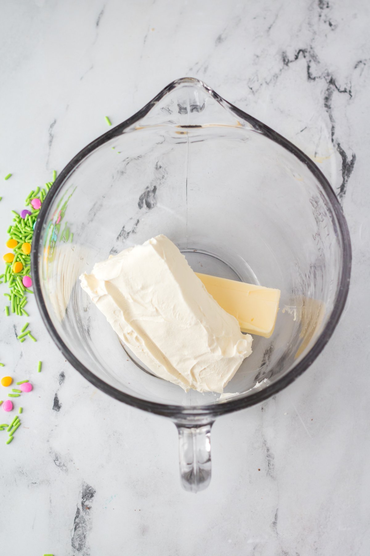 butter and cream cheese in a glass bowl