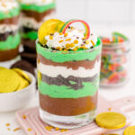 layered St. patrick's Day pudding cups in glasses