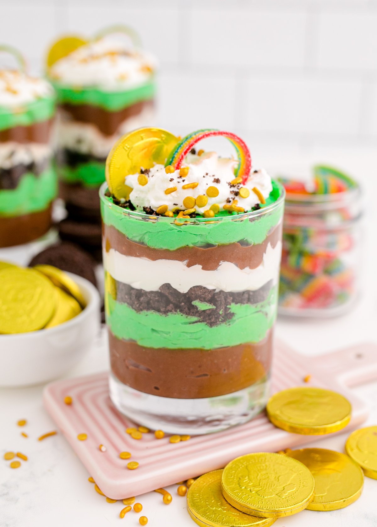 layered St. patrick's Day pudding cups in glasses