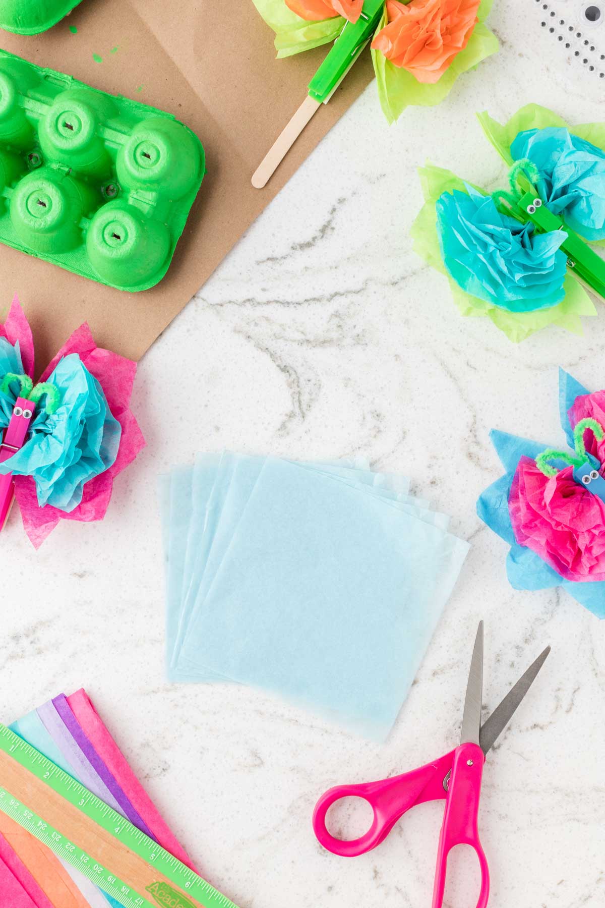 squares of tissue paper stacked on top of each other