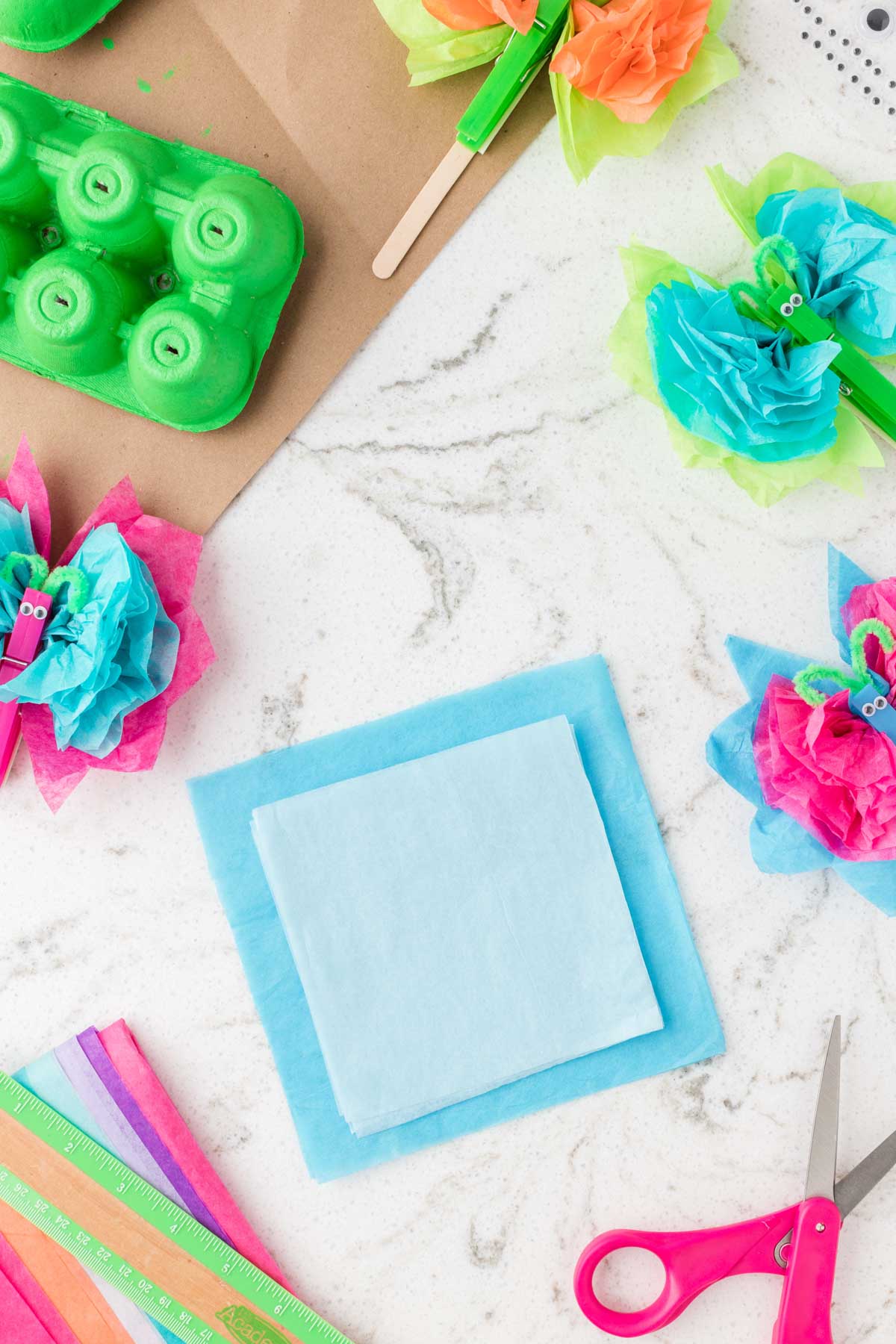 blue squares of tissue paper