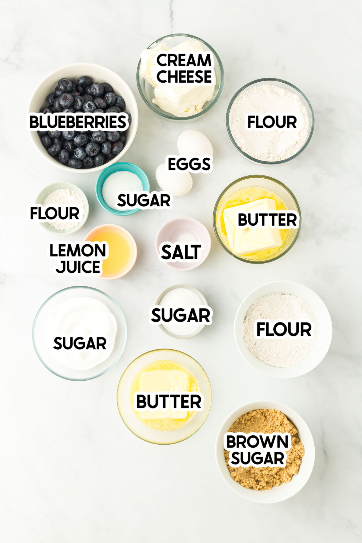 ingredients for blueberry cheesecake bars with labels