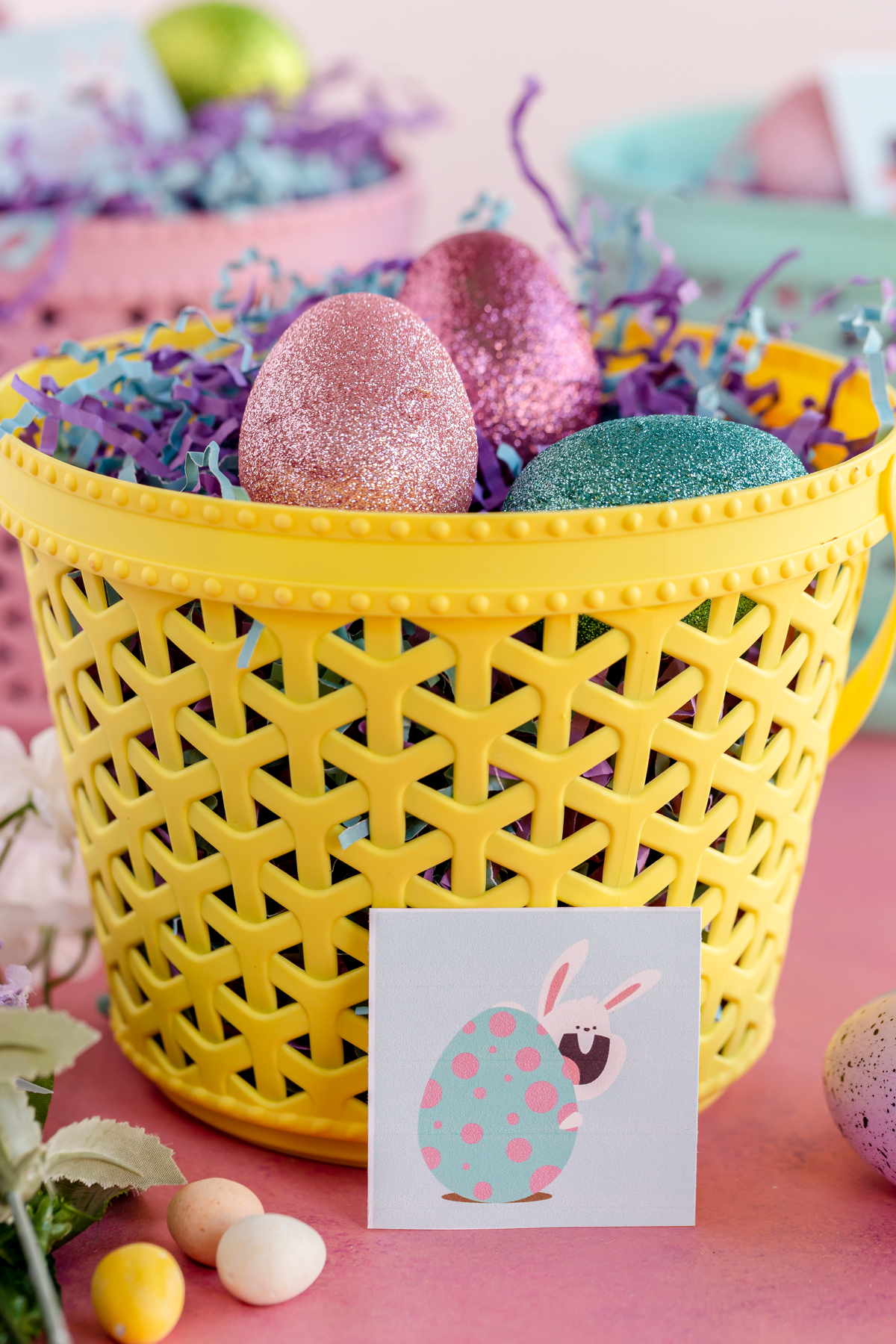 Easter basket with an Easter bunny hunt card in front of it