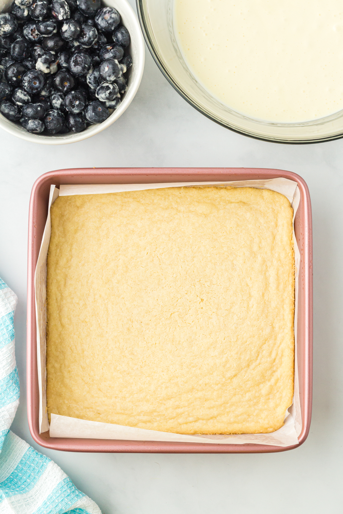 baked shortbread crust in a square pan