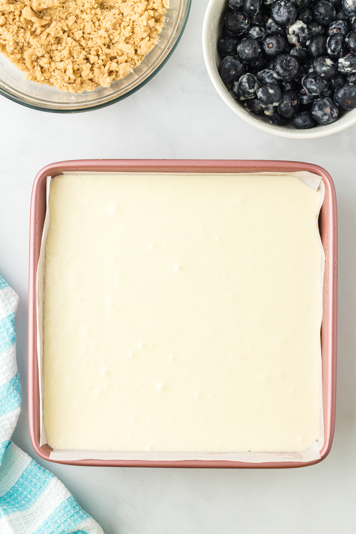 cheesecake filling in a square pan