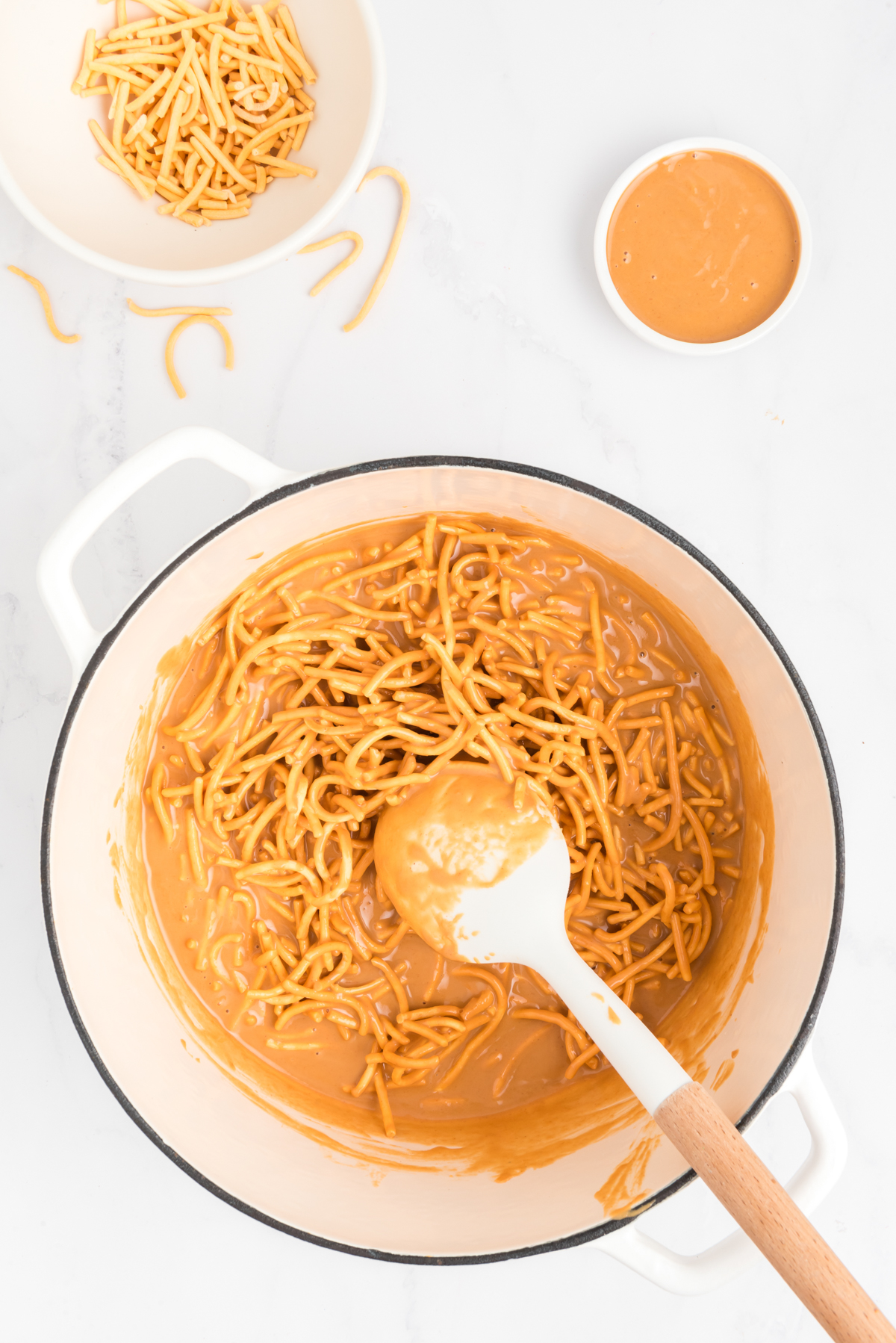 chow mein noodles mixed into butterscotch mixture