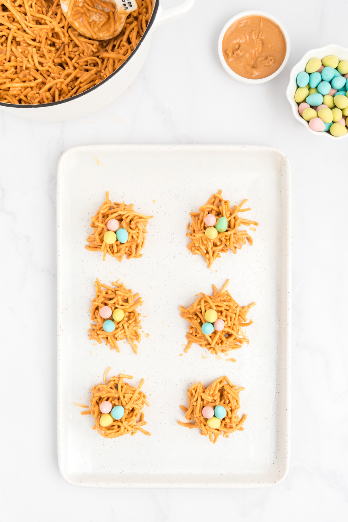 butterscotch haystacks with eggs on a baking sheet