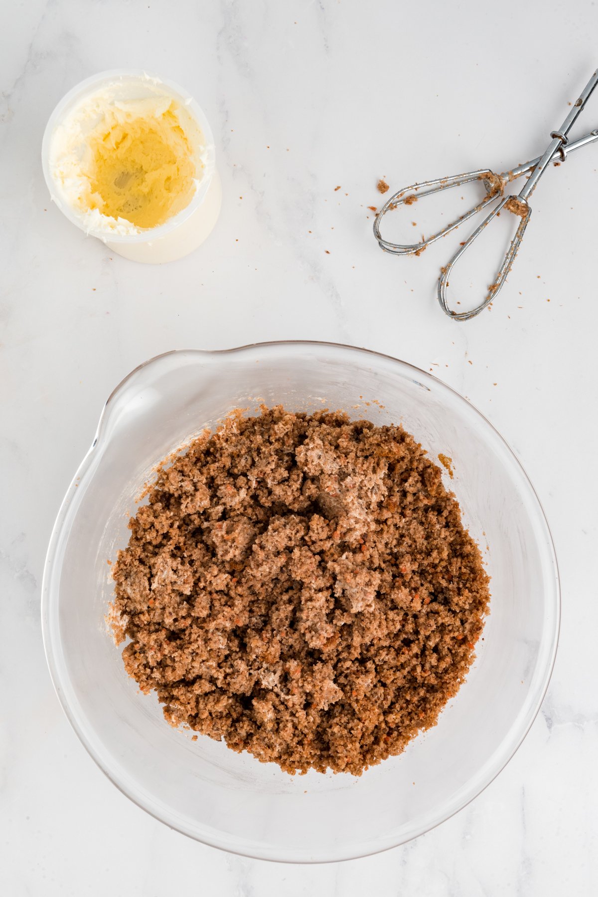 mixture for carrot cake balls in a glass bowl