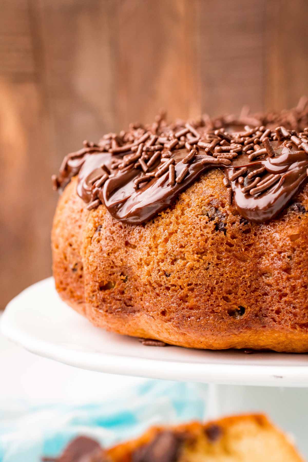 chocolate chip bundt cake on a cake stand