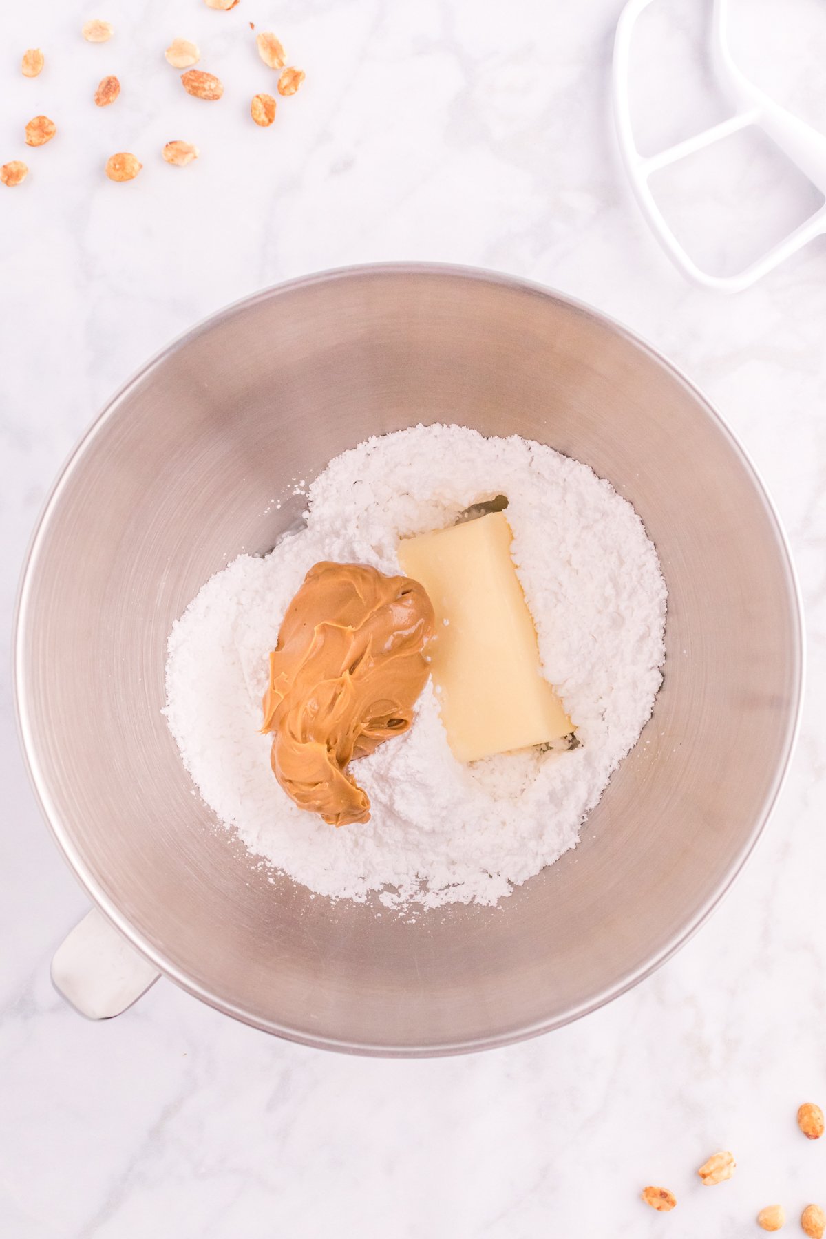 ingredients for peanut butter frosting in a bowl