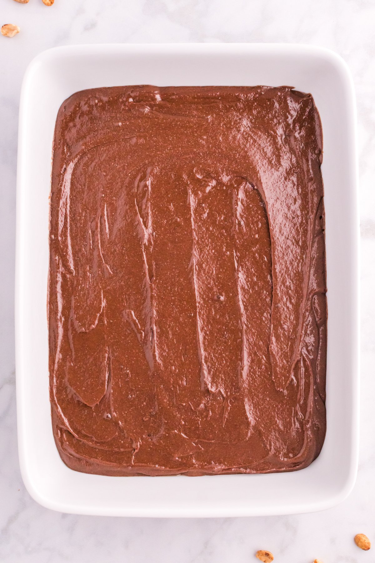 brownie batter in a baking pan