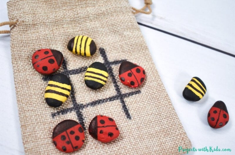 painted rocks on a burlap sack