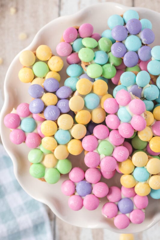 mini flower cookies on a plate