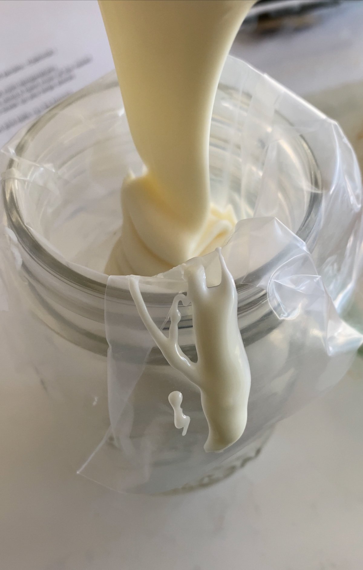 melted white chocolate in a jar