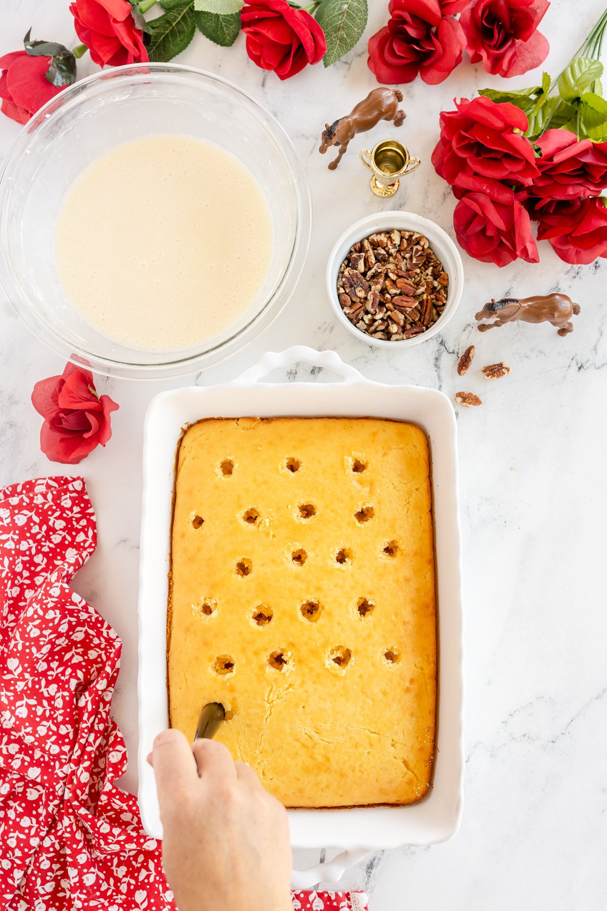 poking holes into a Kentucky butter cake