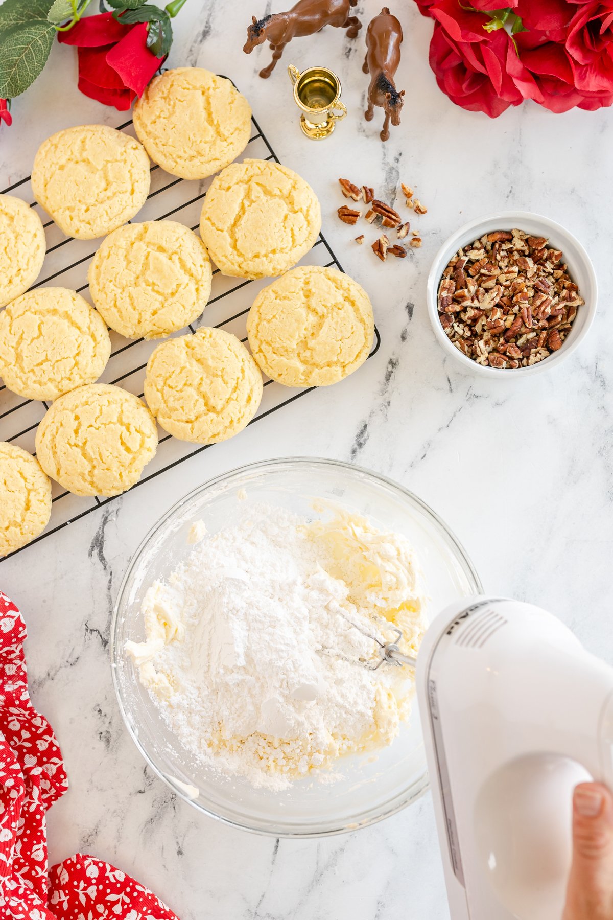 combining butter and cream cheese in a glass bowl