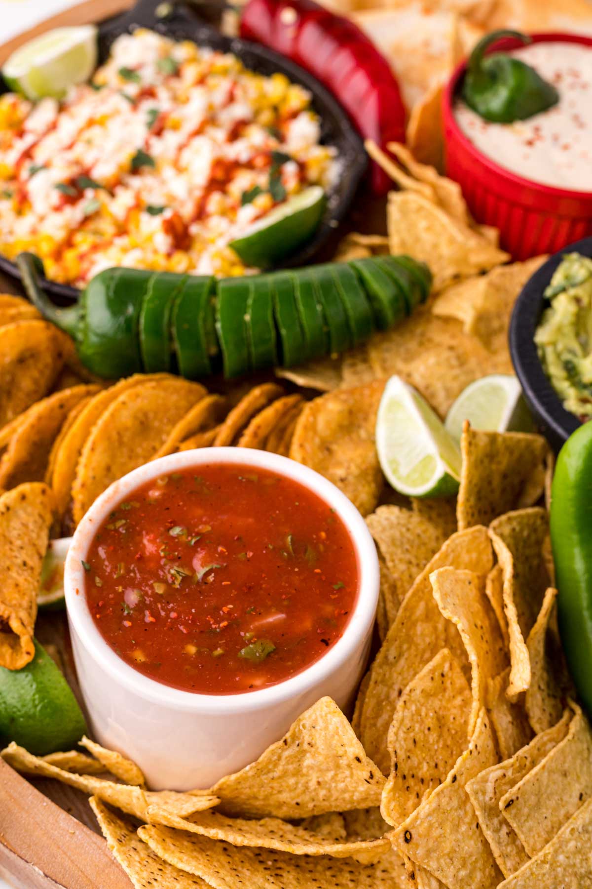 chips and salsa on a Mexican food board