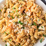 white bowl with Mexican street corn pasta salad