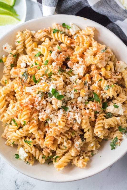 white bowl with Mexican street corn pasta salad