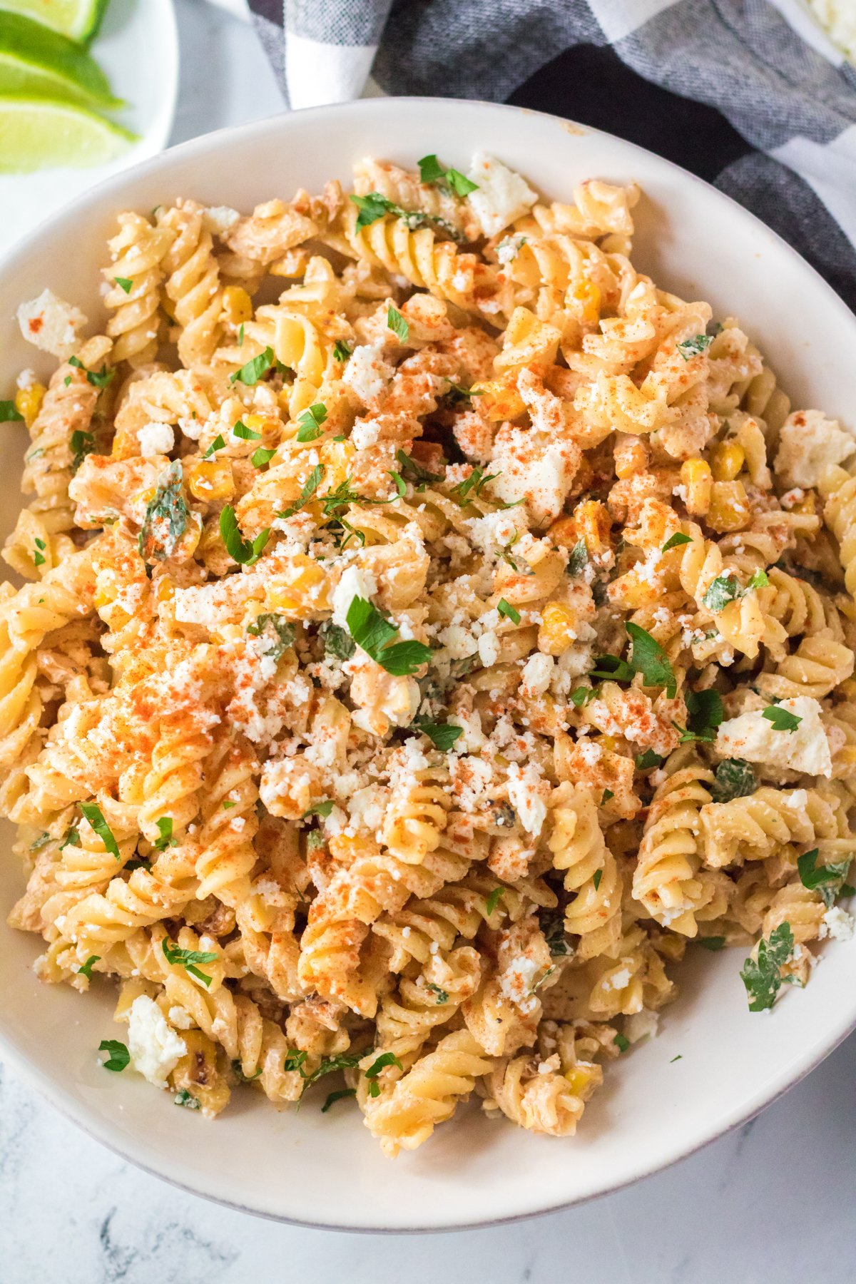white bowl with Mexican street corn pasta salad