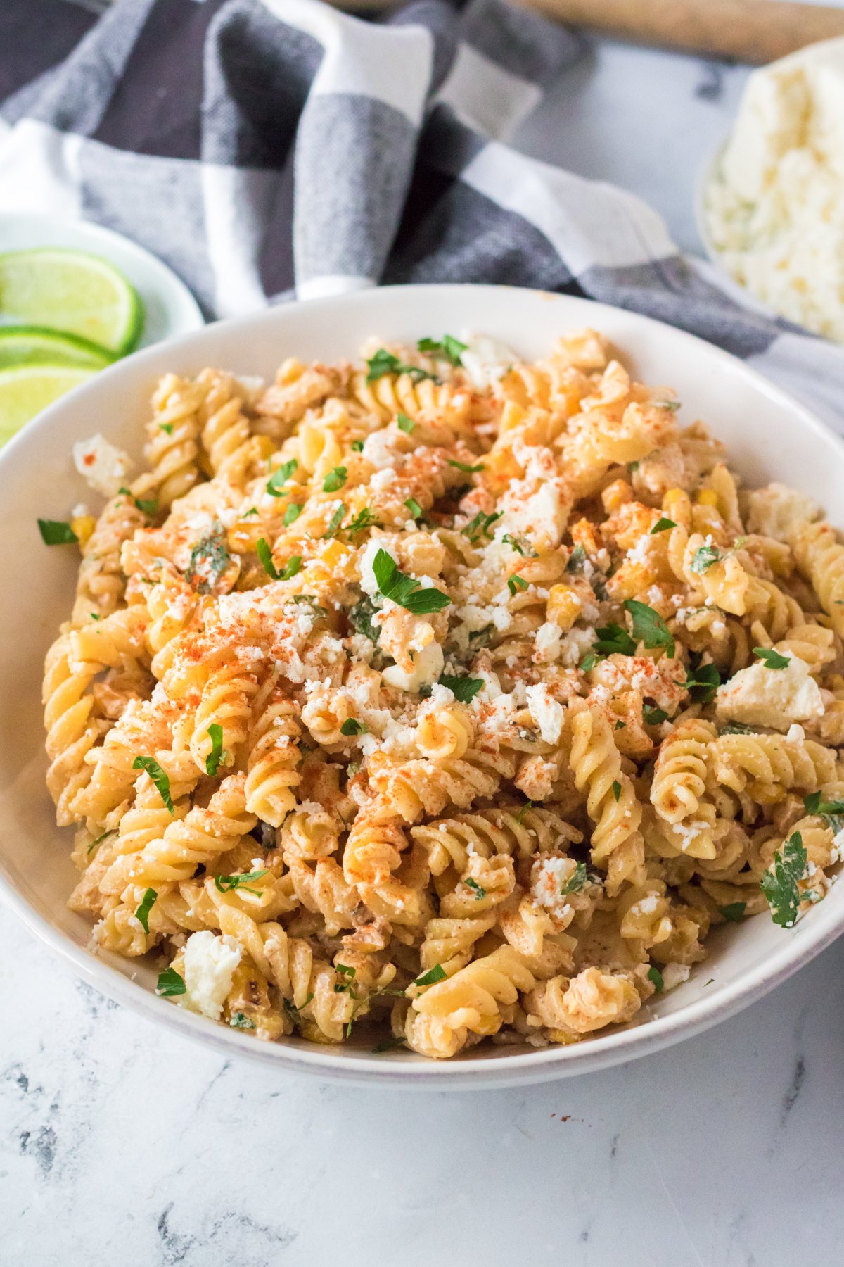 street corn pasta salad in a white bowl