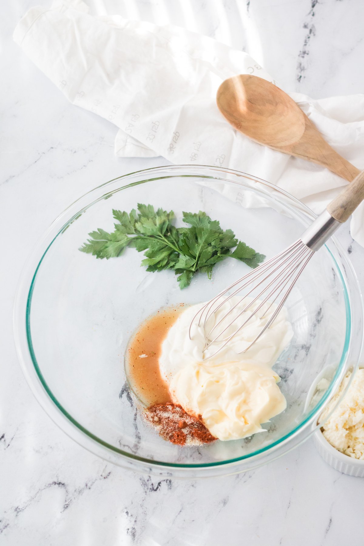 glass bowl with mayo sauce